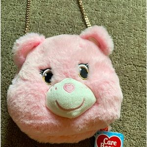 New with tags License Care
Bears Crossbody
Purse Pink Care Bear Face Purse
